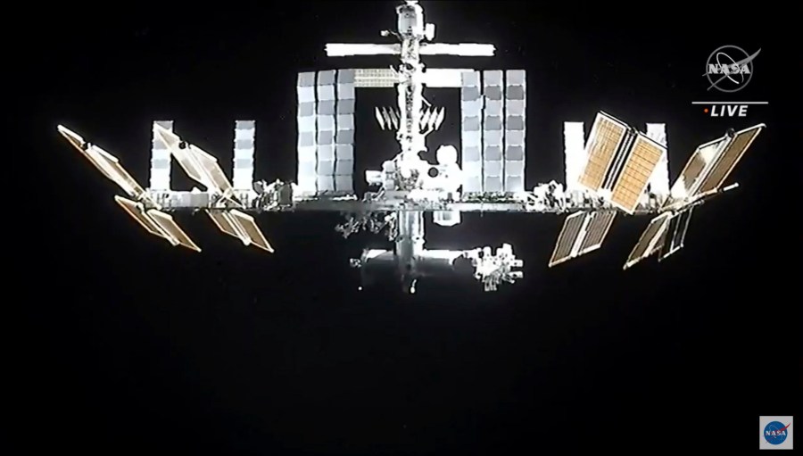 In this image from video provided by NASA, the International Space Station is seen as astronauts in the SpaceX Dragon capsule undock on Monday, Nov. 8, 2021, (NASA via AP)