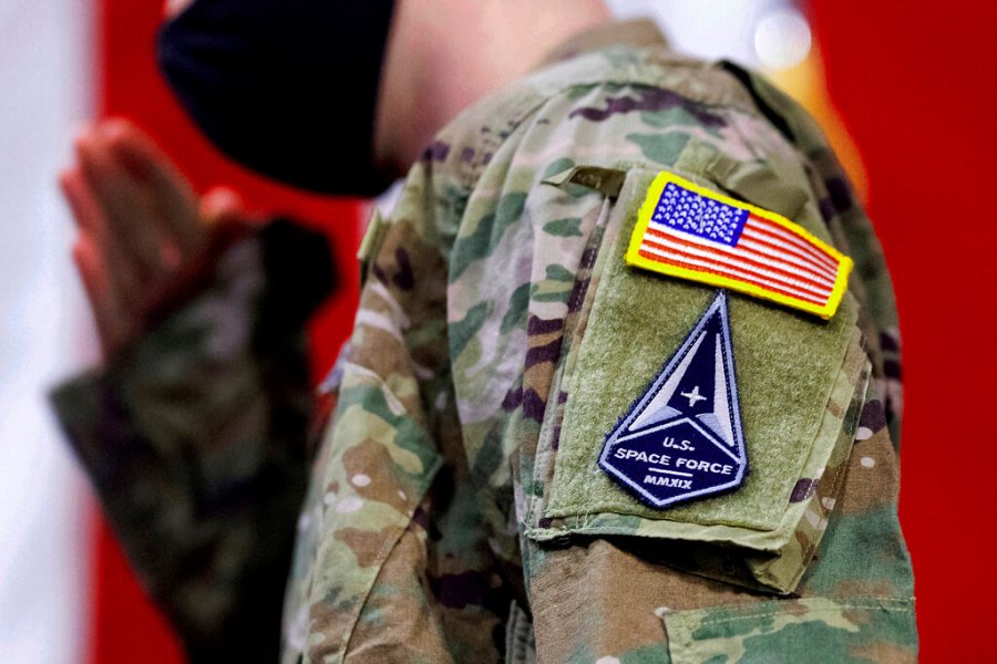 A solider wears a U.S. Space Force uniform during a ceremony for U.S. Air Force airmen transitioning to U.S. Space Force guardian designations at Travis Air Force Base, Calif., Feb. 12, 2021. (AP Photo/Noah Berger, File)