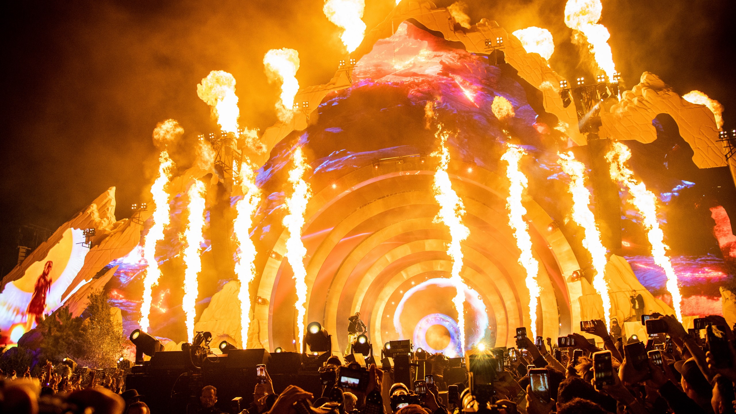 Travis Scott performs at Day 1 of the Astroworld Music Festival at NRG Park on Friday, Nov. 5, 2021, in Houston. Concertgoers described mounting anticipation for the headline rapper that led people to push toward the stage. (Photo by Amy Harris/Invision/AP, File)