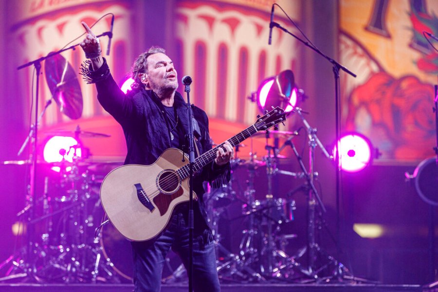 Fher Olvera, center, and the Mexican rock band Mana perform live on stage at Los Angeles Forum on Monday, Nov. 15, 2021, in Inglewood, Calif. (Photo by Willy Sanjuan/Invision/AP)