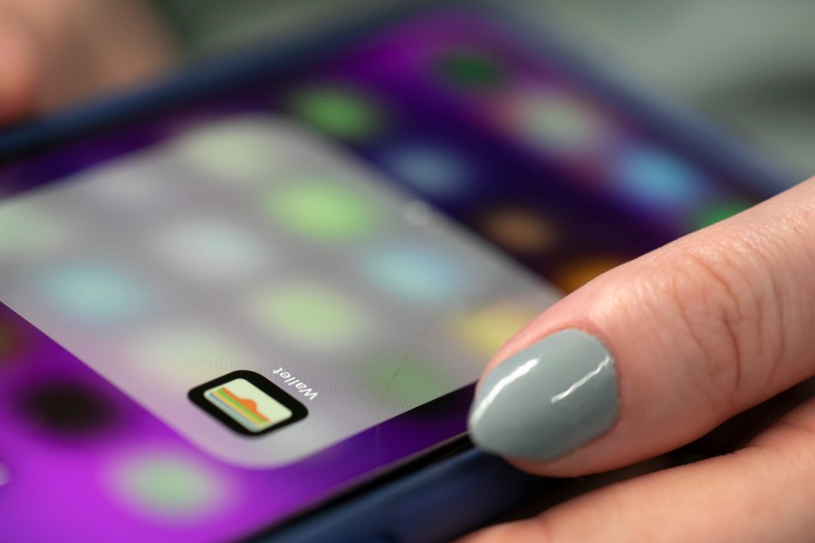 A person uses an iPhone on Oct. 8, 2019, in New York. (AP Photo/Jenny Kane, File)