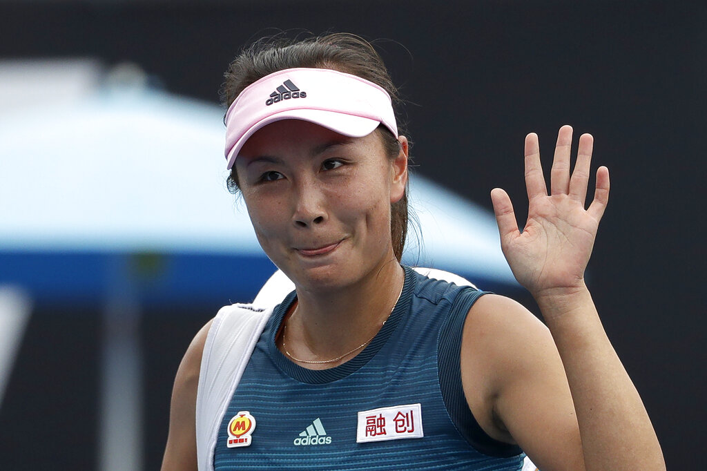 China's Peng Shuai waves after losing to Canada Eugenie Bouchard in their first round match at the Australian Open tennis championships in Melbourne, Australia on Jan. 15, 2019. (AP Photo/Mark Schiefelbein, File)