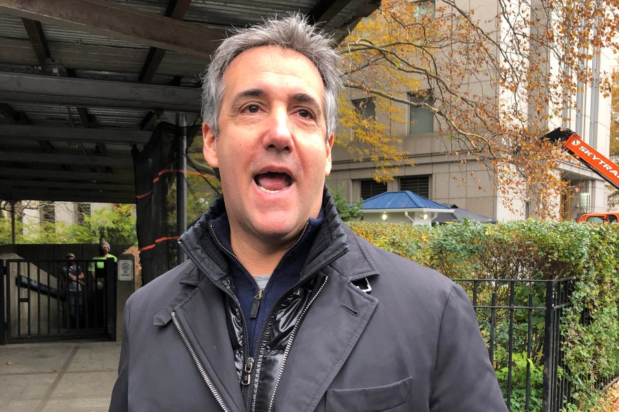 Michael Cohen, former President Donald Trump's longtime personal lawyer, speaks outside Federal Court in New York on Nov. 22, 2021. He came to the courthouse to sign documents and discuss with probation officers what will happen during his court-ordered three years of supervised release. (Lawrence Neumeister/Associated Press)