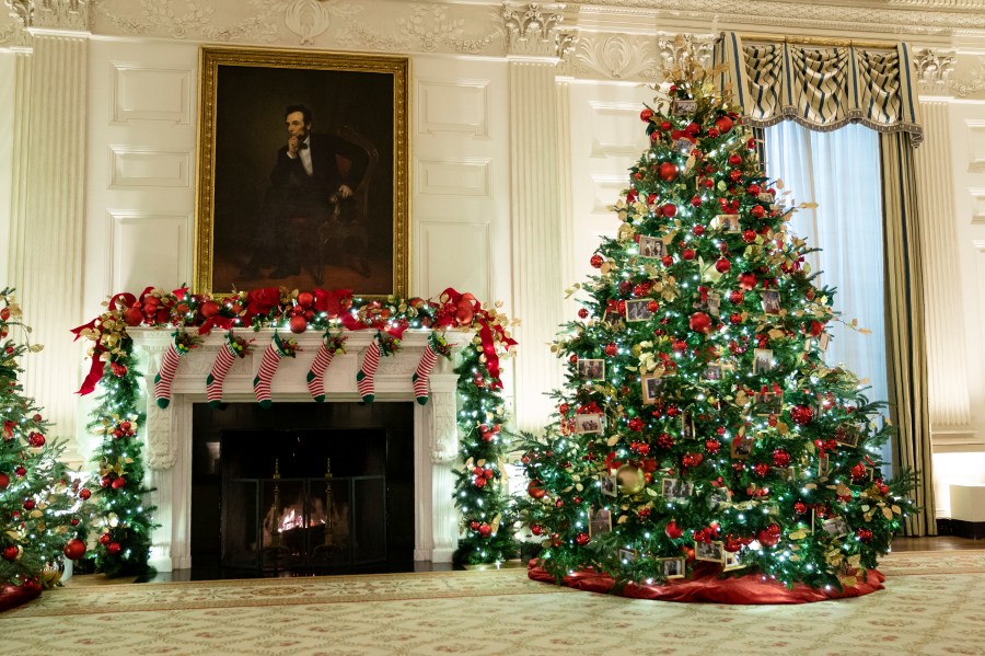 The East Room of the White House is decorated for the holiday season during a press preview of the White House holiday decorations, Monday, Nov. 29, 2021, in Washington. (AP Photo/Evan Vucci)