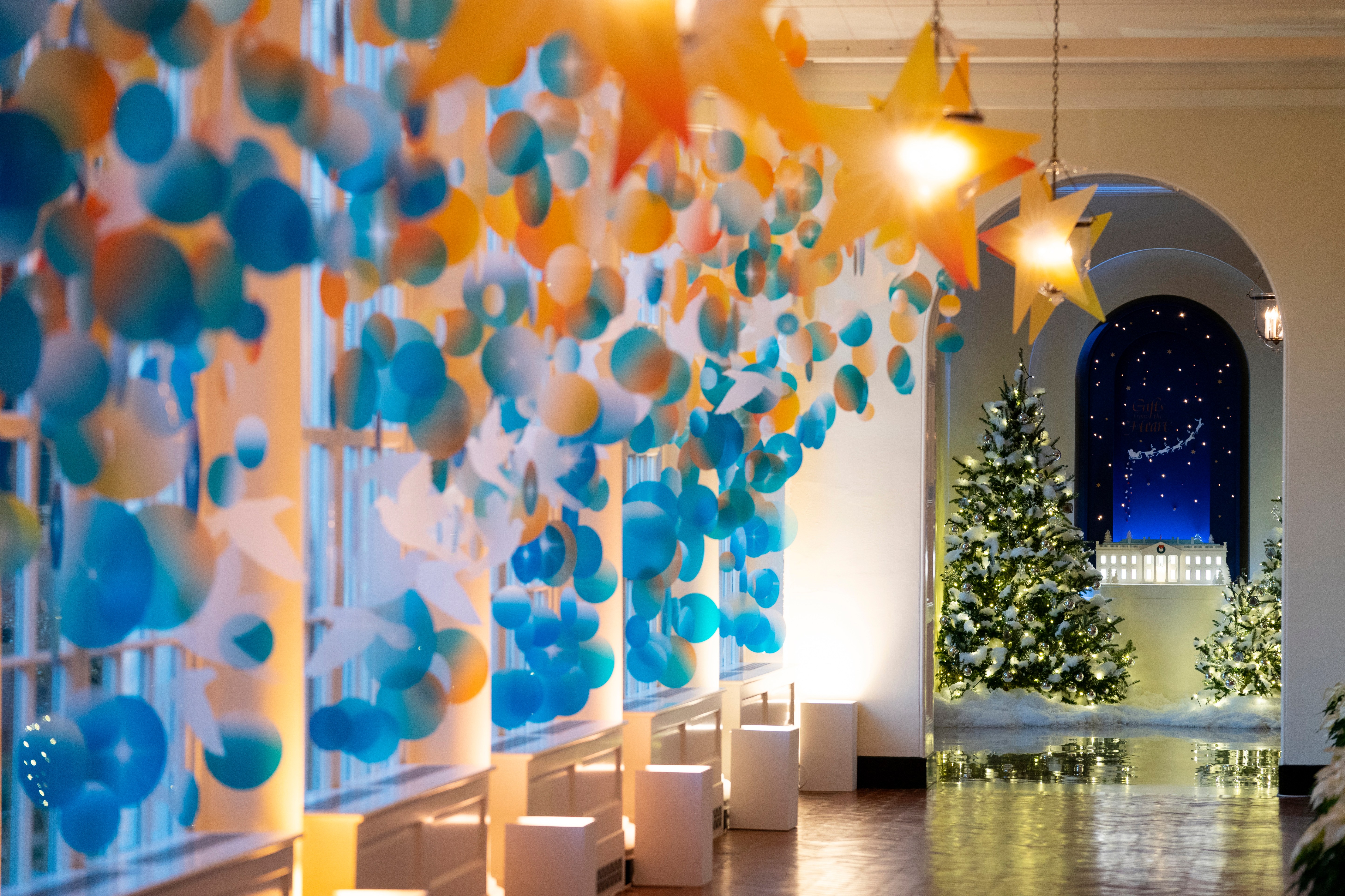 The White House East Colonnade of the White House is decorated for the holiday season during a press preview of the White House holiday decorations, Monday, Nov. 29, 2021, in Washington. (AP Photo/Evan Vucci)