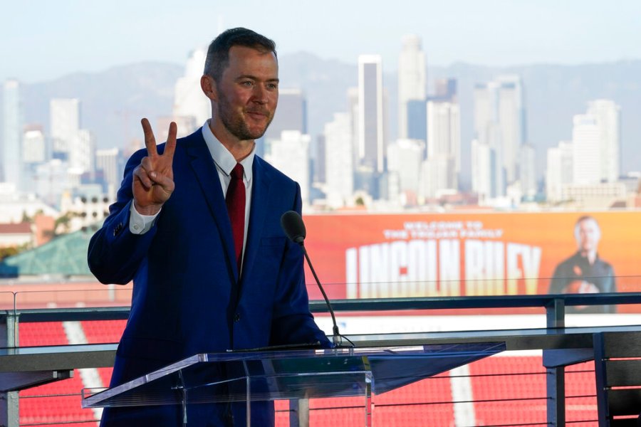 Lincoln Riley, the new head football coach of the University of Southern California, speaks during a ceremony in Los Angeles, Monday, Nov. 29, 2021. (AP Photo/Ashley Landis)