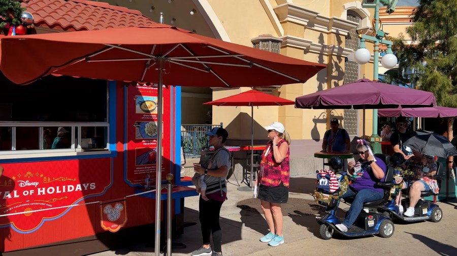 Guests line up for treats at the Cozy Cone Motel at Disney California Adventure Park on Nov. 13, 2021. (KTLA)