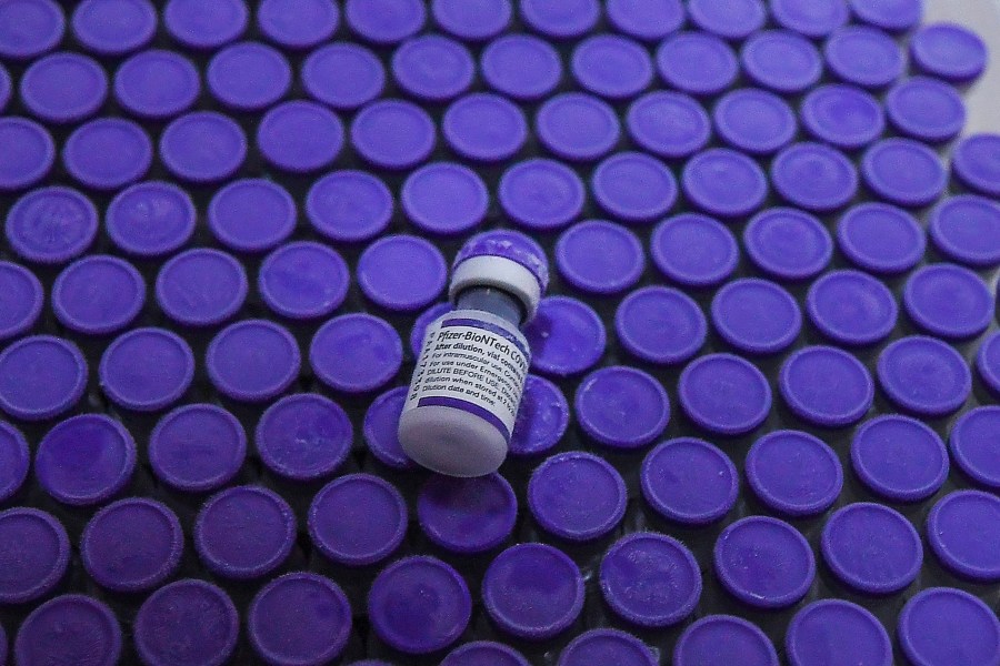 This file photo shows vials of the Pfizer COVID-19 vaccine in Hanoi on Oct. 12, 2021. (NHAC NGUYEN/AFP via Getty Images)