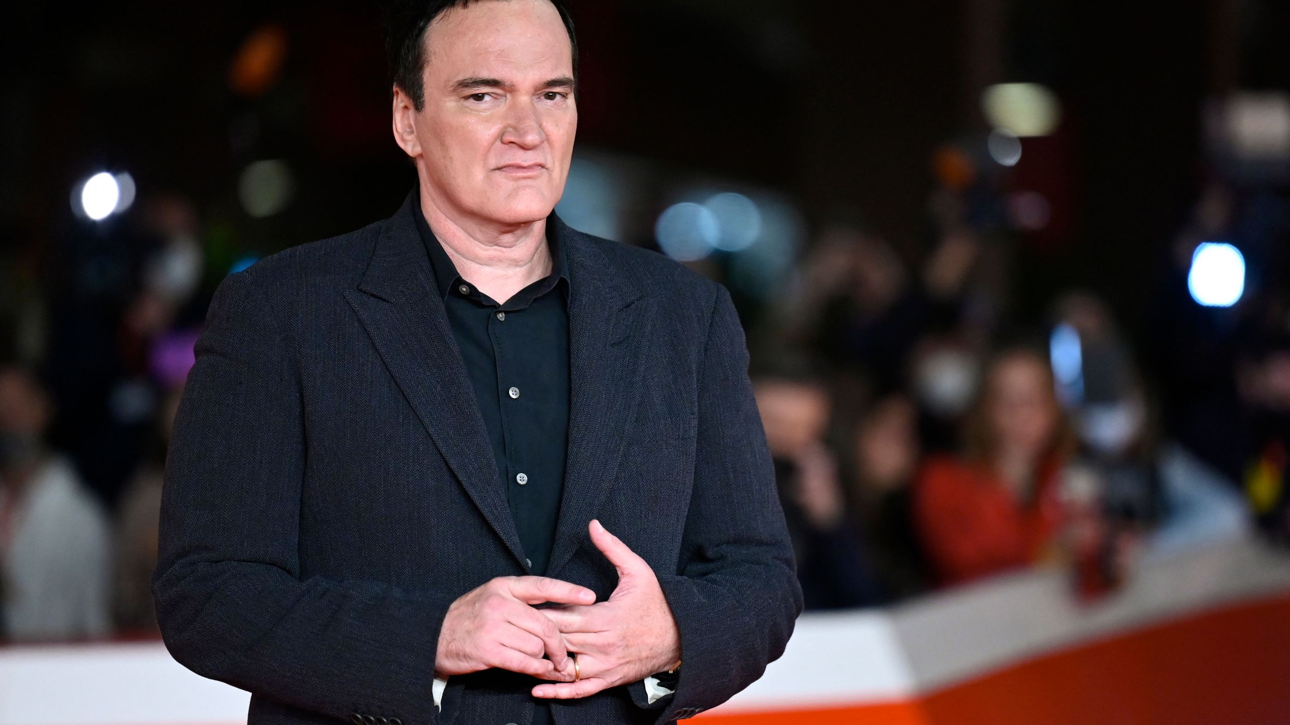 Quentin Tarantino arrives on Oct. 19, 2021 at the Auditorium Parco della Musica venue in Rome to attend a Lifetime Achievement Award ceremony in his honour during the 16th Rome Film Festival. (ALBERTO PIZZOLI/AFP via Getty Images)