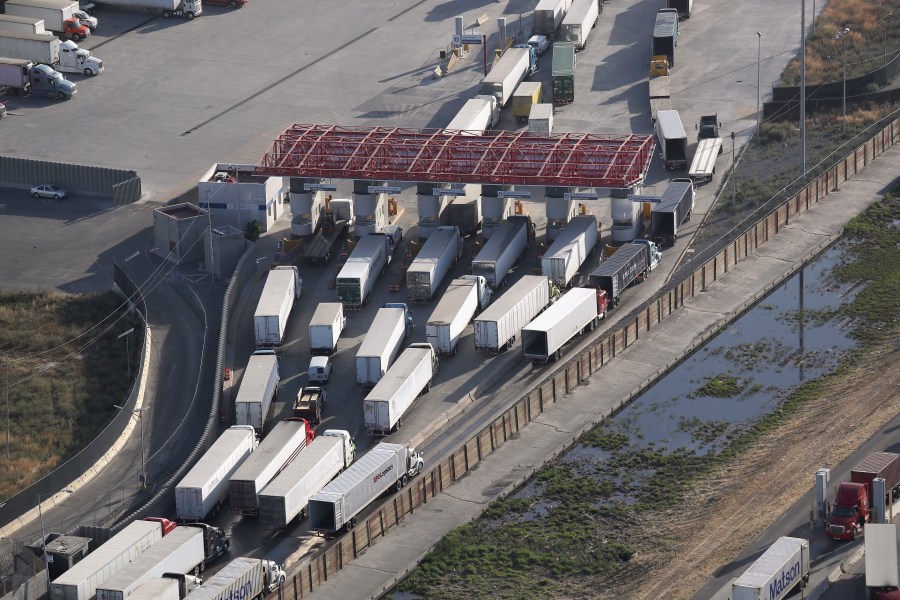 Freight trucks, as seen from a helicopter, pass through Mexican Customs before entering the United States at the Otay Mesa port of entry on May 11, 2017 in San Diego. (John Moore/Getty Images)