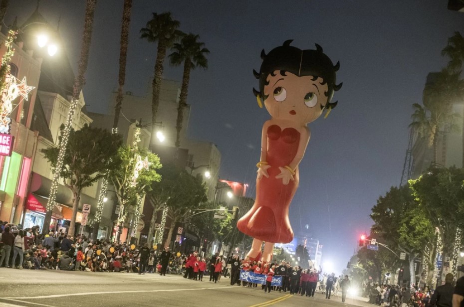 A Betty Boop balloon floats above Hollywood Boulevard at the Hollywood Christmas Parade in November 2017. (Brian van der Brug/Los Angeles Times)