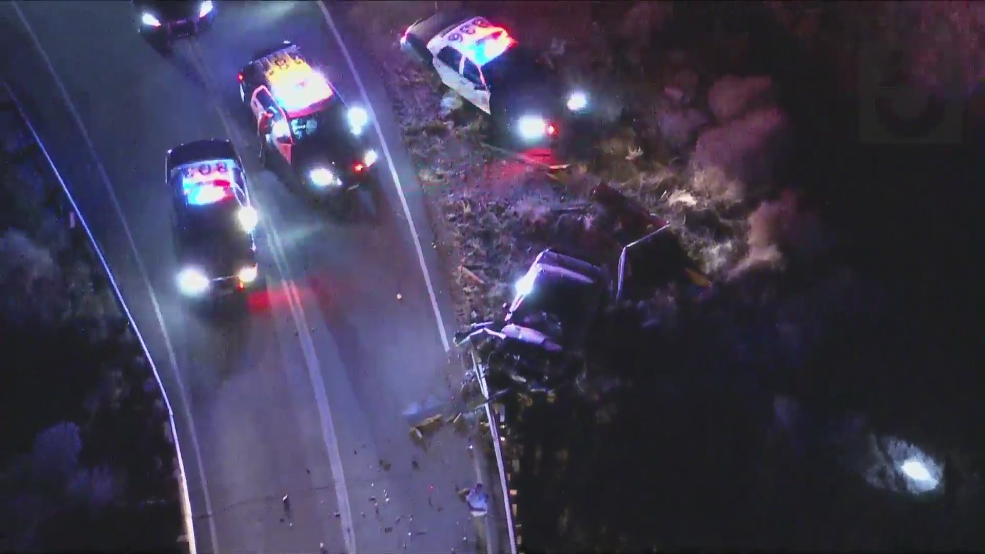 A pursuit on Nov. 12, 2021, ended with a crashed car on Soledad Canyon Road. (KTLA)