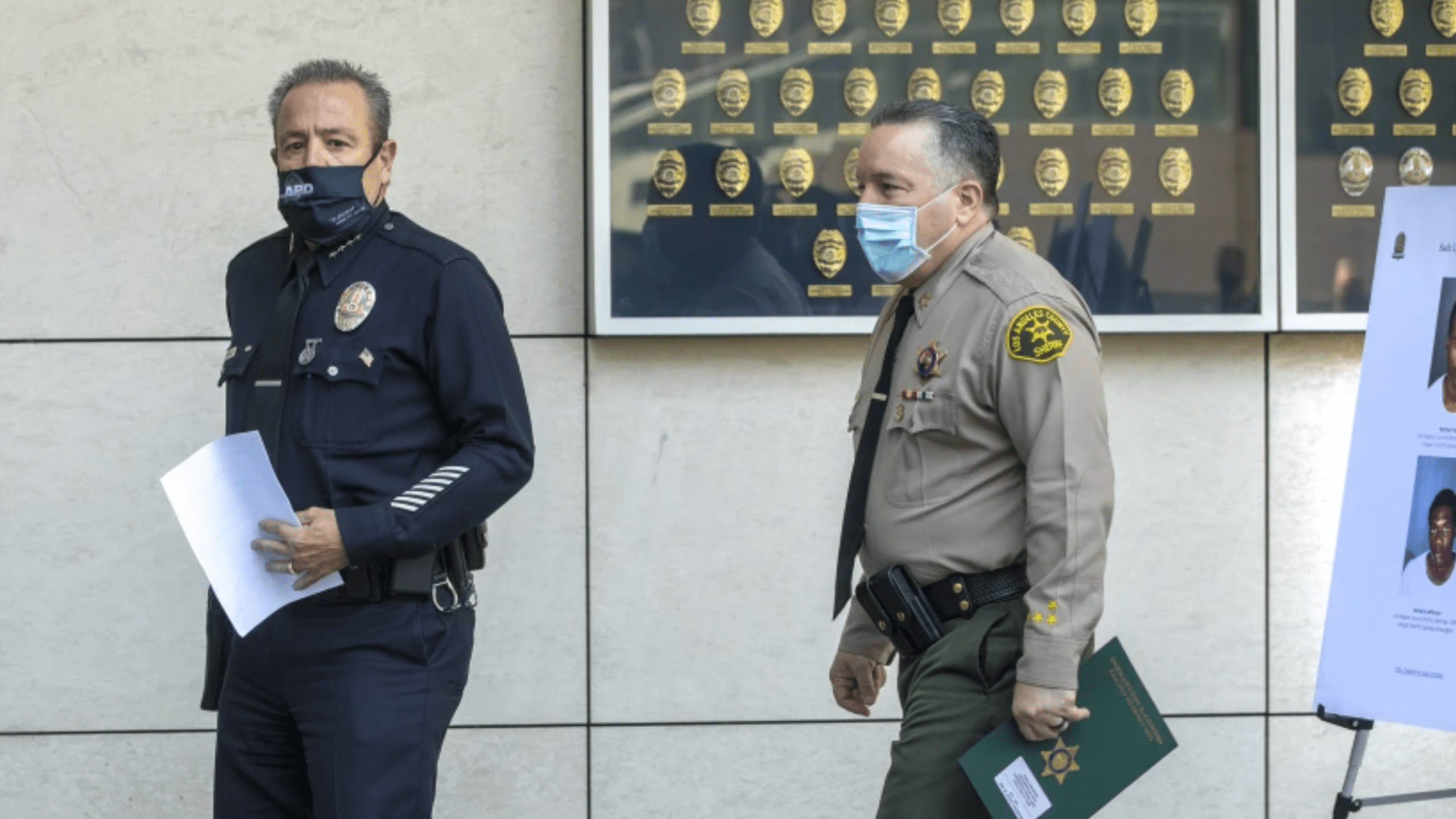 LAPD Chief Michel Moore, left, with Los Angeles County Sheriff Alex Villanueva. (Mel Melcon/Los Angeles Times)