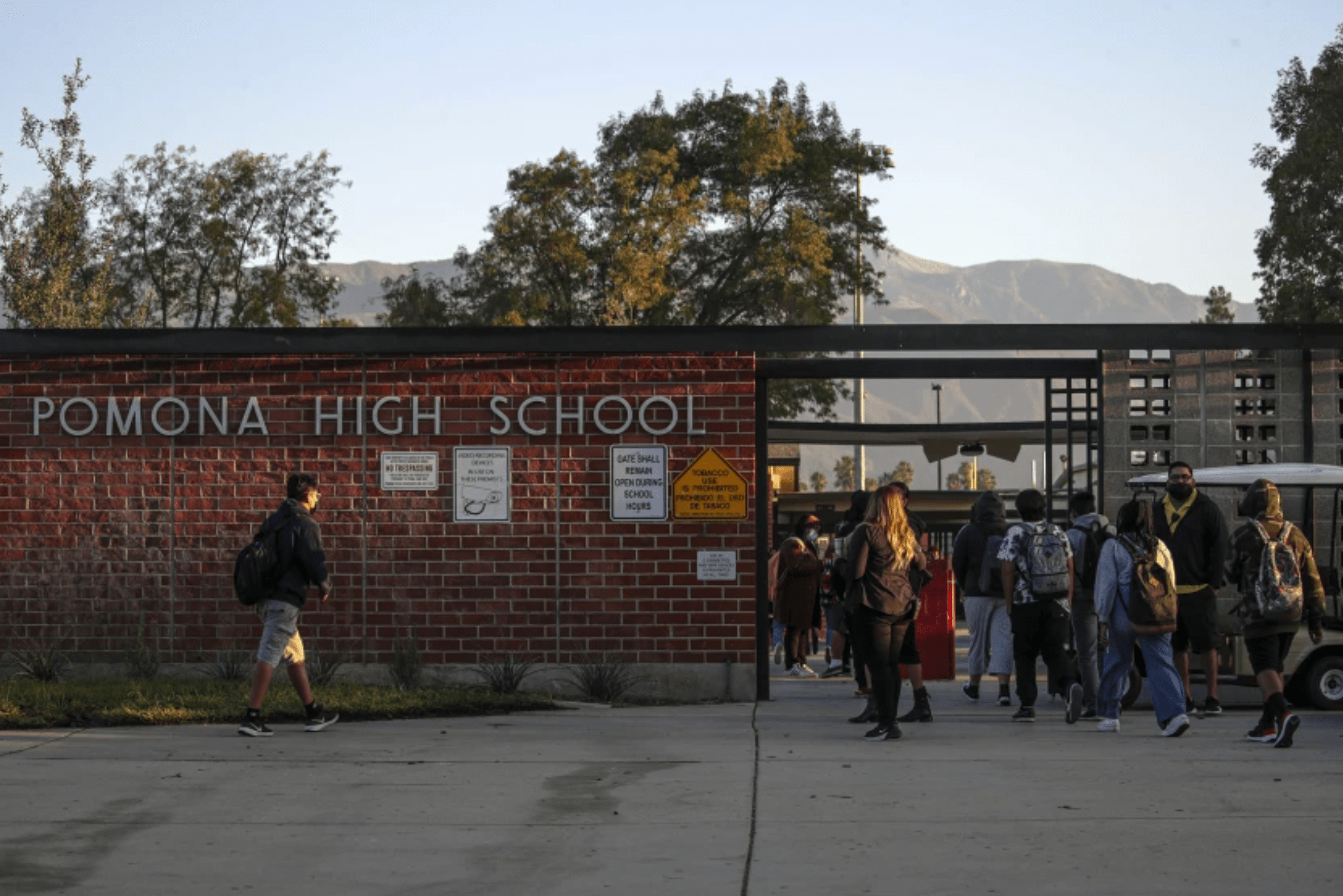 Students arrive for classes at Pomona High School on Wednesday.(Irfan Khan / Los Angeles Times)