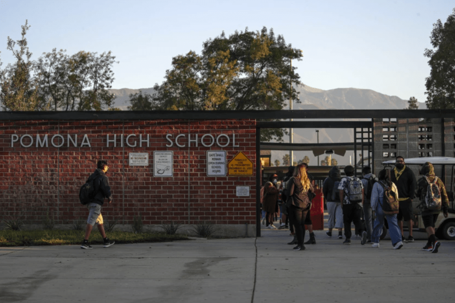 Students arrive for classes at Pomona High School on Wednesday.(Irfan Khan / Los Angeles Times)