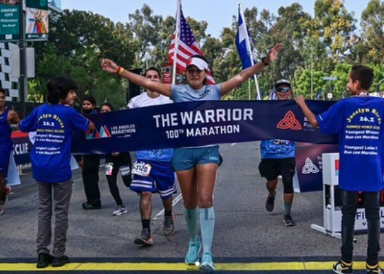 Jocelyn Rivas is shown crossing the finish line at the L.A. Marathon on NOv. 7, 2021. (Donald Miralle/L.A. Marathon)