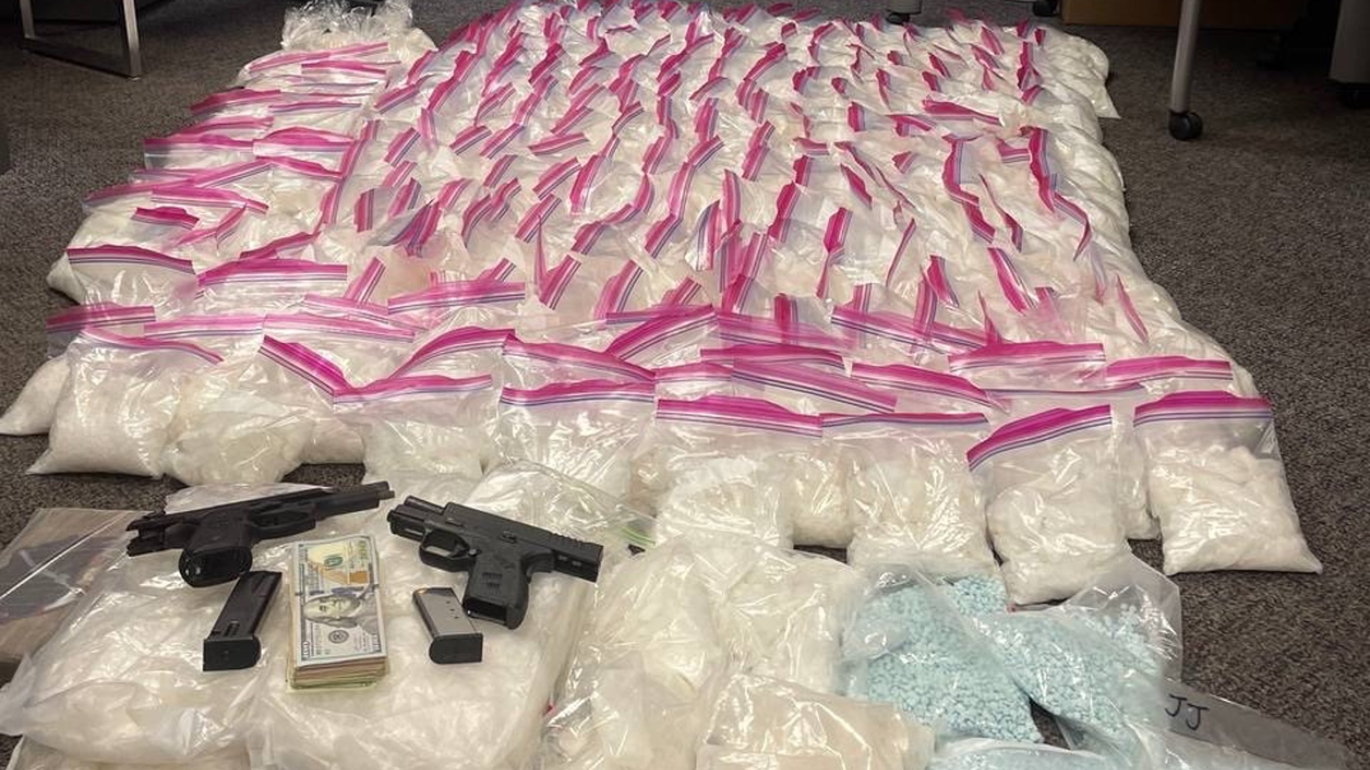 Police arrested two people on Nov. 9, 2021, in the city of Bell and seized about $1 million worth of drugs and two handguns. (Huntington Beach Police Department)