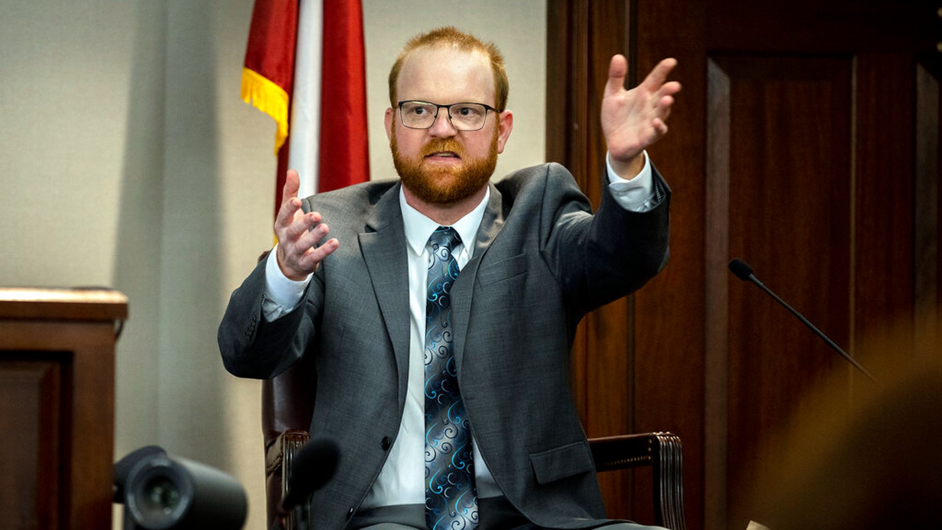 Travis McMichael speaks from the witness stand during his trial Wednesday, Nov. 17, 2021, in Brunswick, Ga. (AP Photo/Stephen B. Morton, Pool)