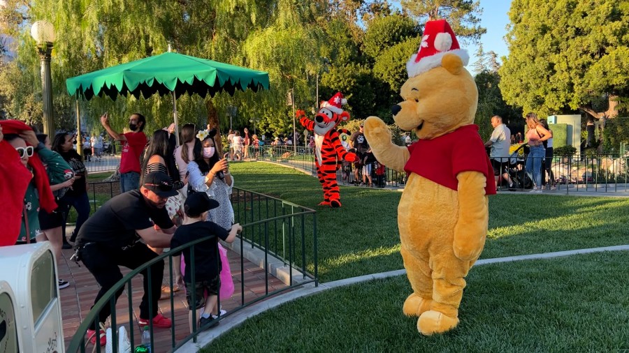 Winnie the Pooh greets guests at Disneyland on Nov. 13, 2021. (KTLA)