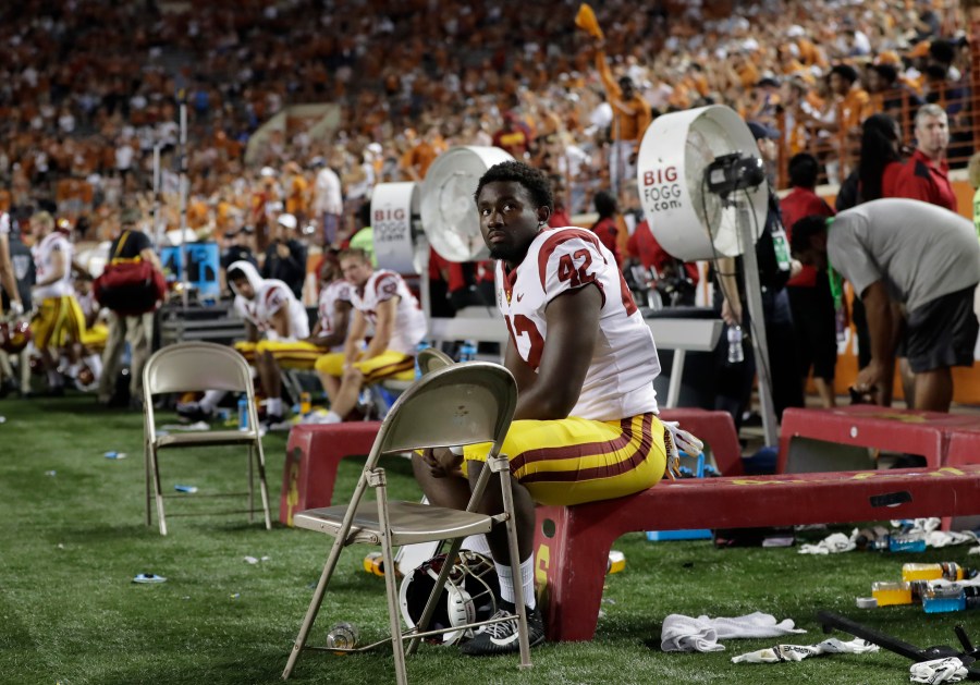 USC linebacker Abdul-Malik McClain (42) sits on the bench during the final seconds of the second half of an NCAA college football game in a 37-14 loss to Texas on Sept. 15, 2018, in Austin, Texas. (AP Photo/Eric Gay)