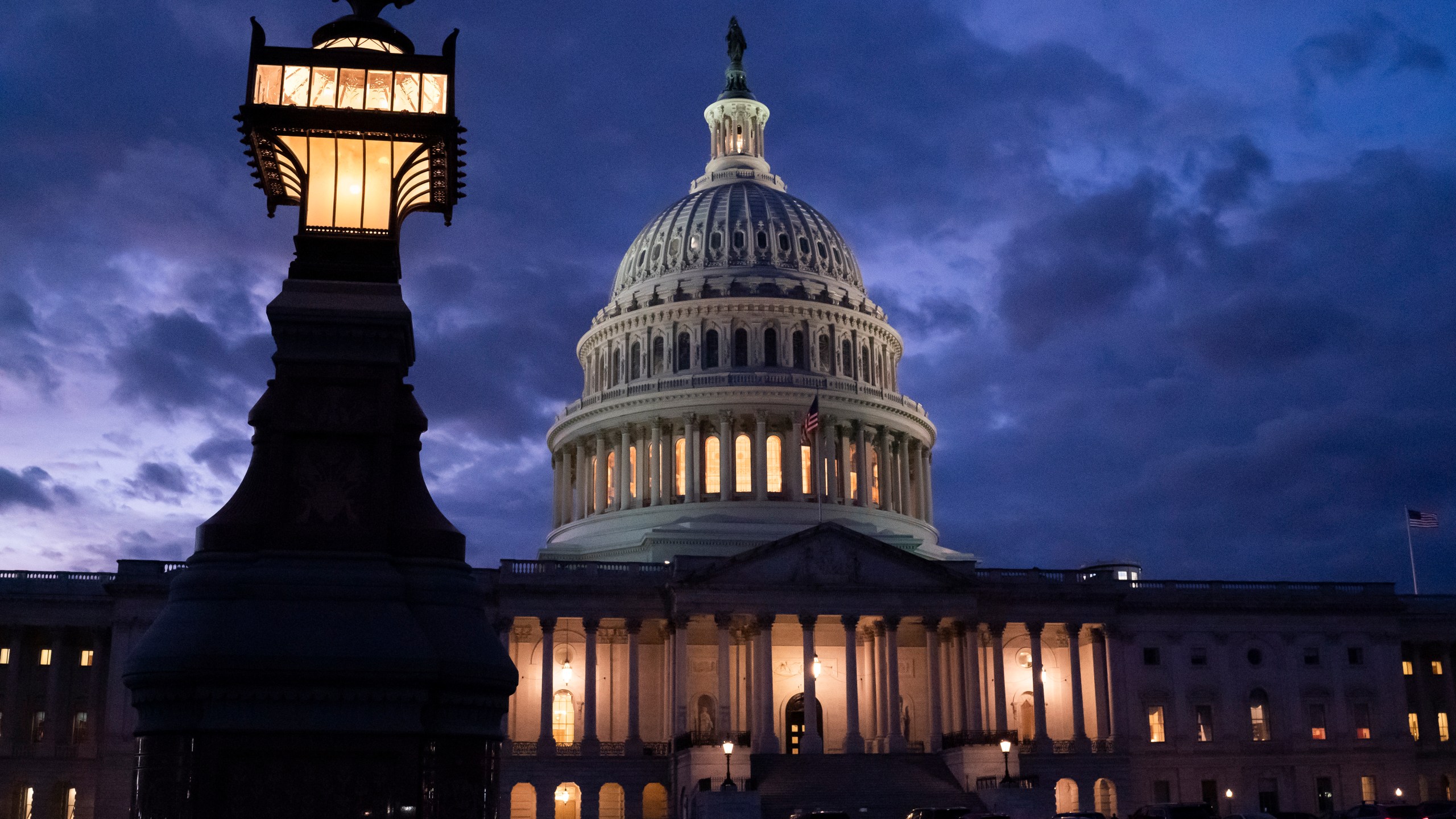 Night falls at the the Capitol in Washington on Dec. 2, 2021, with the deadline to fund the government approaching. (AP Photo/J. Scott Applewhite)