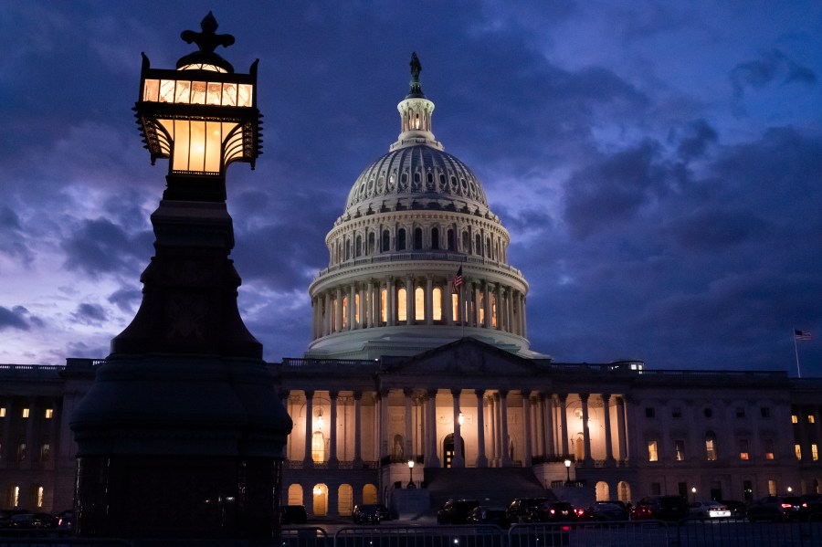 Night falls at the the Capitol in Washington on Dec. 2, 2021, with the deadline to fund the government approaching. (AP Photo/J. Scott Applewhite)