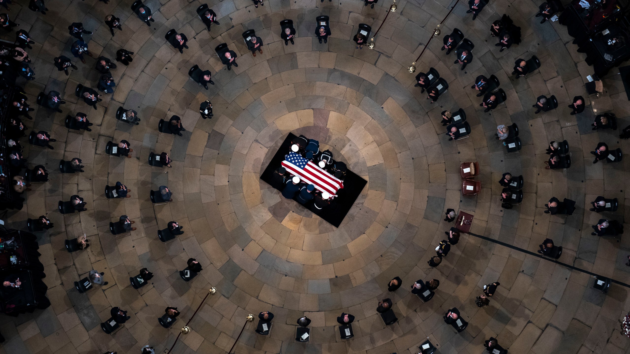 The casket of former Sen. Bob Dole, R-Kan., arrives in the Rotunda of the U.S. Capitol, where he will lie in state on Dec. 9, 2021, on Capitol Hill in Washington. (AP Photo/Andrew Harnik, Pool)