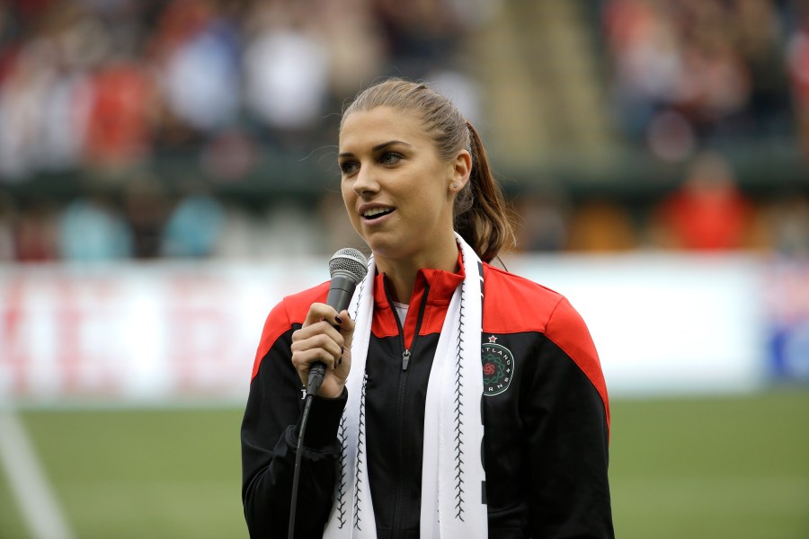 Portland Thorns forward Alex Morgan speaks to the crowd before their NWSL soccer match against the Seattle Reign in Portland, Ore., July 22, 2015. (AP Photo/Don Ryan, file)