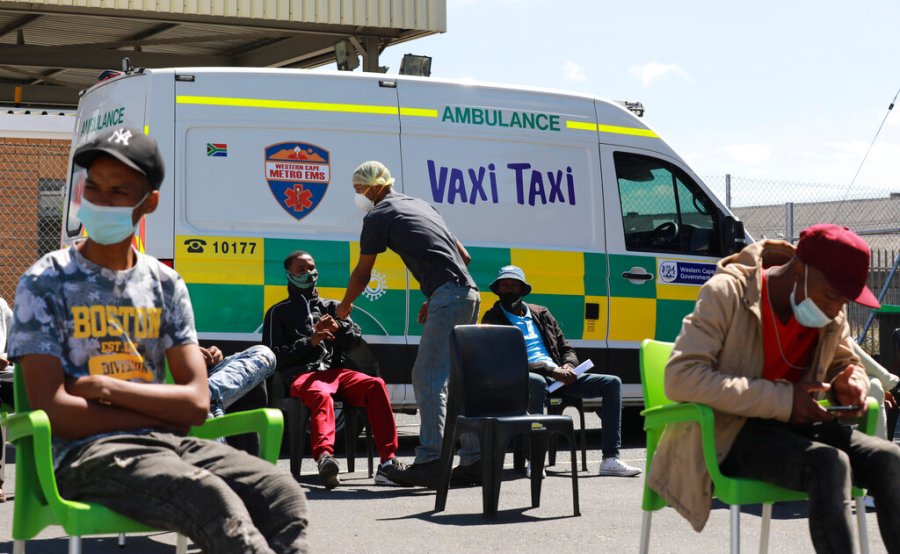 People wait to be vaccinated at a mobile "Vaxi Taxi" which is an ambulance converted into a mobile COVID-19 vaccination site in Blackheath in Cape Town, South Africa. (AP Photo/Nardus Engelbrecht)