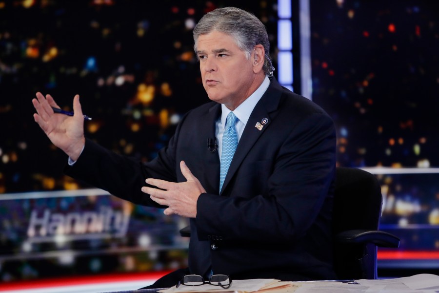 Fox News host Sean Hannity speaks during a taping of his show, "Hannity," on Aug. 7, 2019, in New York. The revelation that Fox News Channel personalities sent text messages to the White House during the Jan. 6 insurrection urging President Donald Trump to call off the attack is the latest example of the network's stars seeking to influence the actions of newsmakers instead of simply reporting the news.(AP Photo/Frank Franklin II, File)