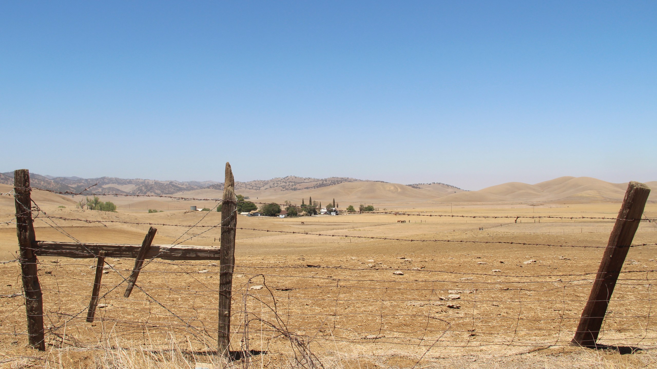 A barbed wire fence runs along a ranch in Sites, Calif., on July 23, 2021. This ranch would be underwater once the Sites Reservoir is completed. (AP Photo/Adam Beam, File)