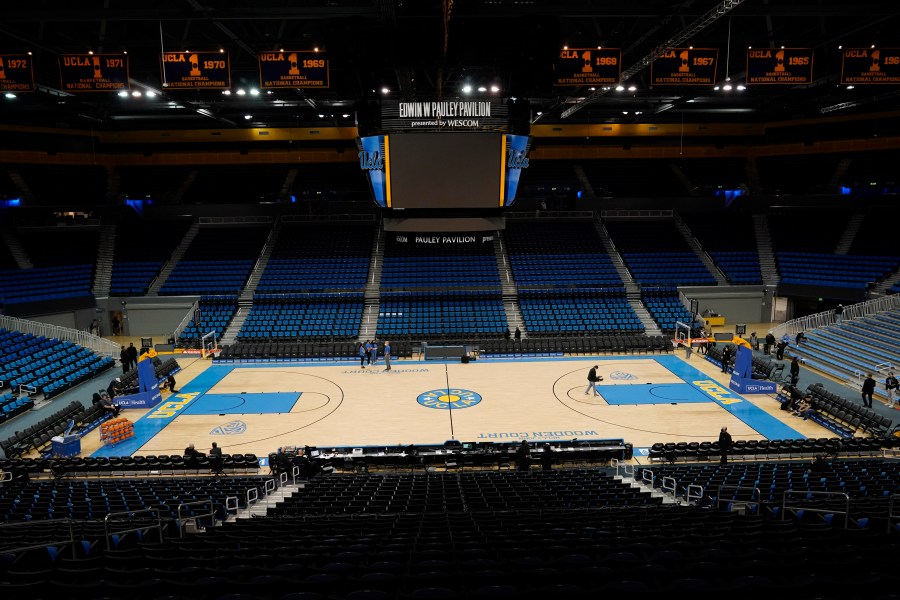 An empty Pauley Pavilion is seen before an NCAA college basketball game between UCLA and Alabama State Wednesday, Dec. 15, 2021, in Los Angeles. The game will not be played due to COVID-19 protocols. (AP Photo/Marcio Jose Sanchez)