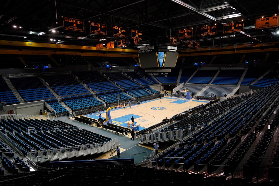 An empty Pauley Pavilion is seen before an NCAA college basketball game between UCLA and Alabama State Wednesday, Dec. 15, 2021, in Los Angeles. (AP Photo/Marcio Jose Sanchez)