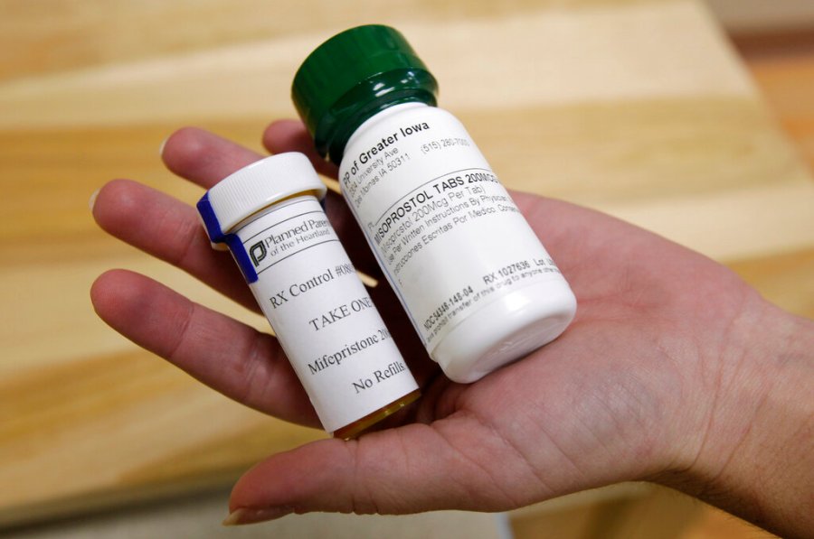 This Sept. 22, 2010 file photo shows bottles of abortion pills at a clinic in Des Moines, Iowa. The Food and Drug Administration on Thursday, Dec. 16, 2021 loosened some restrictions on the pill mifepristone, allowing it to be dispensed by more pharmacies. (AP Photo/Charlie Neibergall, file)