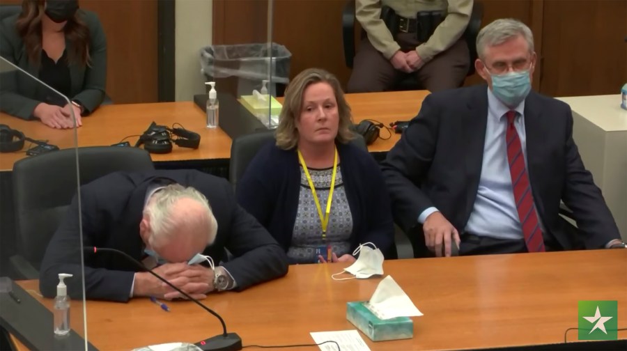 In this screen grab from video, former Brooklyn Center Police Officer Kim Potter center, with defense attorney Earl Gray, left, and Paul Engh sit at the defense table after the verdict is read on Dec.,23, 2021 at the Hennepin County Courthouse in Minneapolis. (Court TV via AP, Pool)