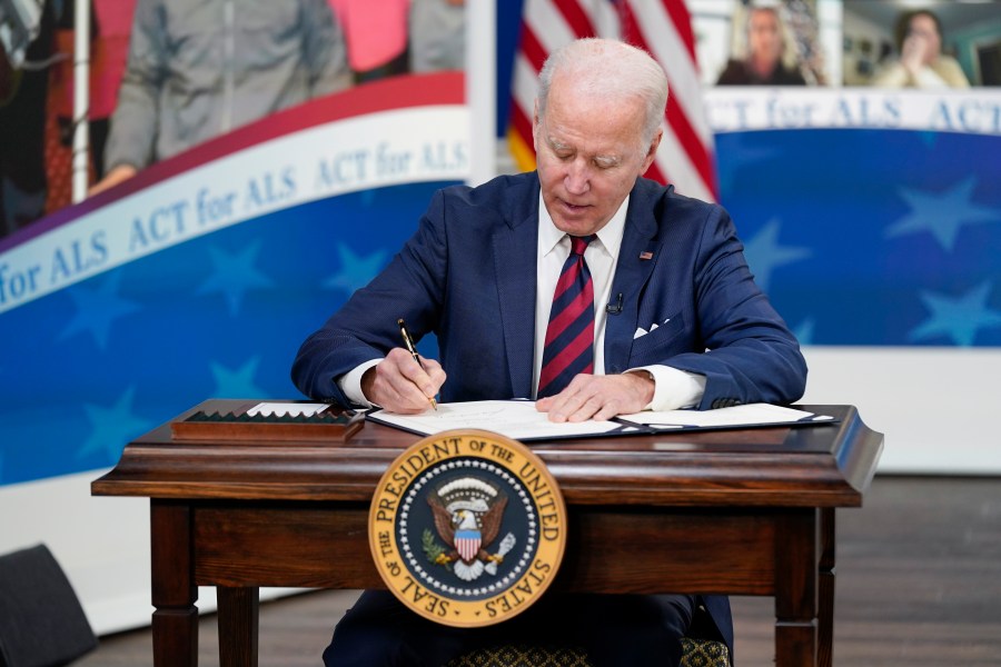 President Joe Biden is seen in the South Court Auditorium on the White House campus in Washington, Thursday, Dec. 23, 2021. (AP Photo/Patrick Semansky)