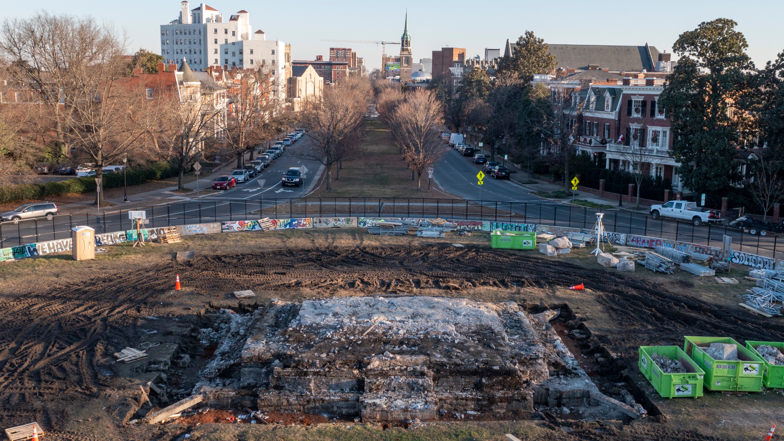 A pile of rubble is all that is left after the removal of the pedestal that once held the statue of Confederate General Robert E. Lee on Monument Ave., Thursday Dec. 23, 2021, in Richmond, Va. Workers will continue their search for a famed 1887 time capsule that was said to be buried under the massive monument. A box found in the pedestal did not contain items described in historic papers. (AP Photo/Steve Helber)