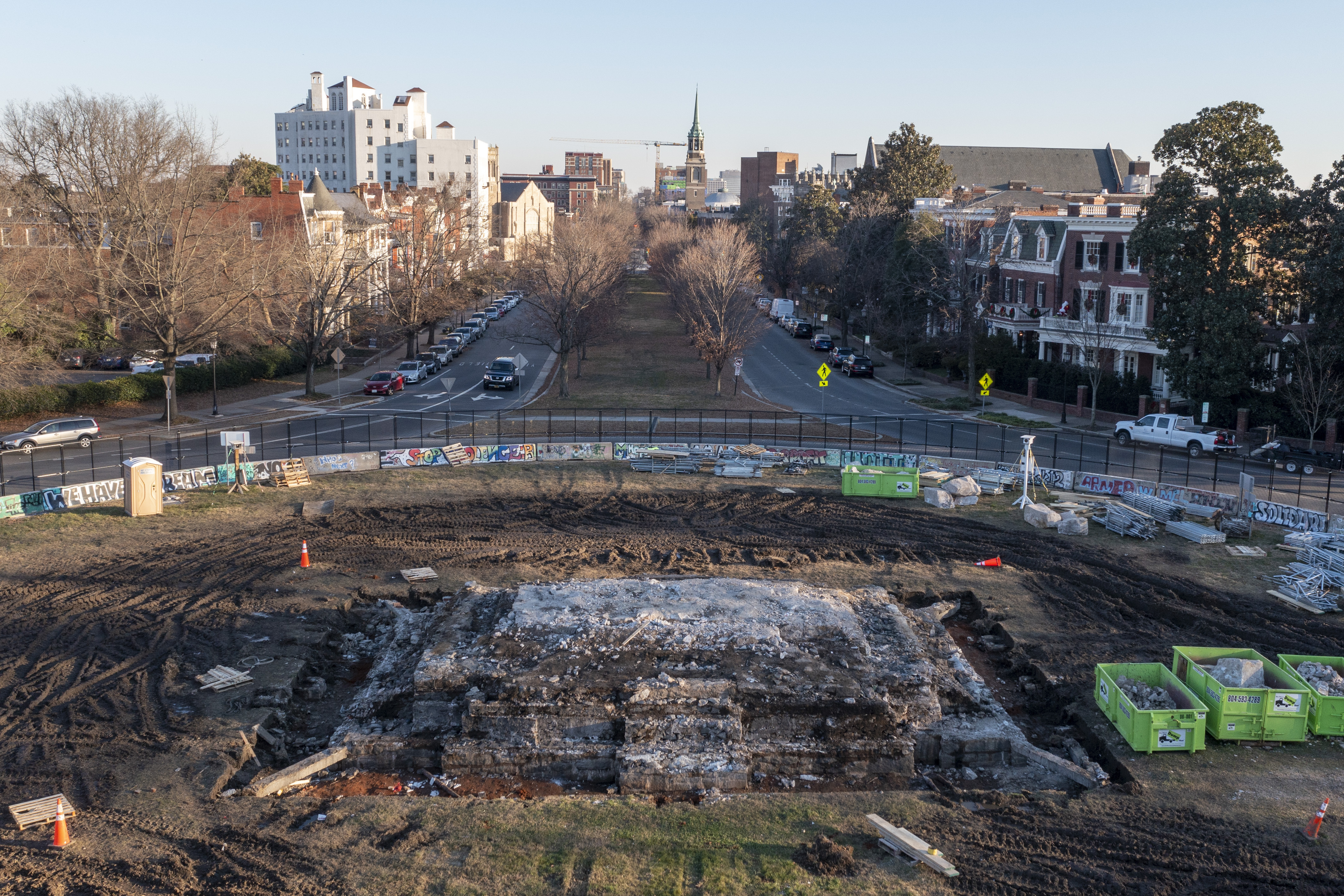 A pile of rubble is all that is left after the removal of the pedestal that once held the statue of Confederate General Robert E. Lee on Monument Ave., Thursday Dec. 23, 2021, in Richmond, Va. Workers will continue their search for a famed 1887 time capsule that was said to be buried under the massive monument. A box found in the pedestal did not contain items described in historic papers. (AP Photo/Steve Helber)