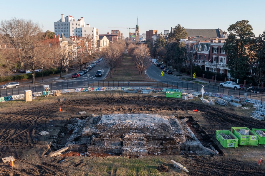 A pile of rubble is all that is left after the removal of the pedestal that once held the statue of Confederate General Robert E. Lee on Monument Ave., Thursday Dec. 23, 2021, in Richmond, Va. Workers will continue their search for a famed 1887 time capsule that was said to be buried under the massive monument. A box found in the pedestal did not contain items described in historic papers. (AP Photo/Steve Helber)