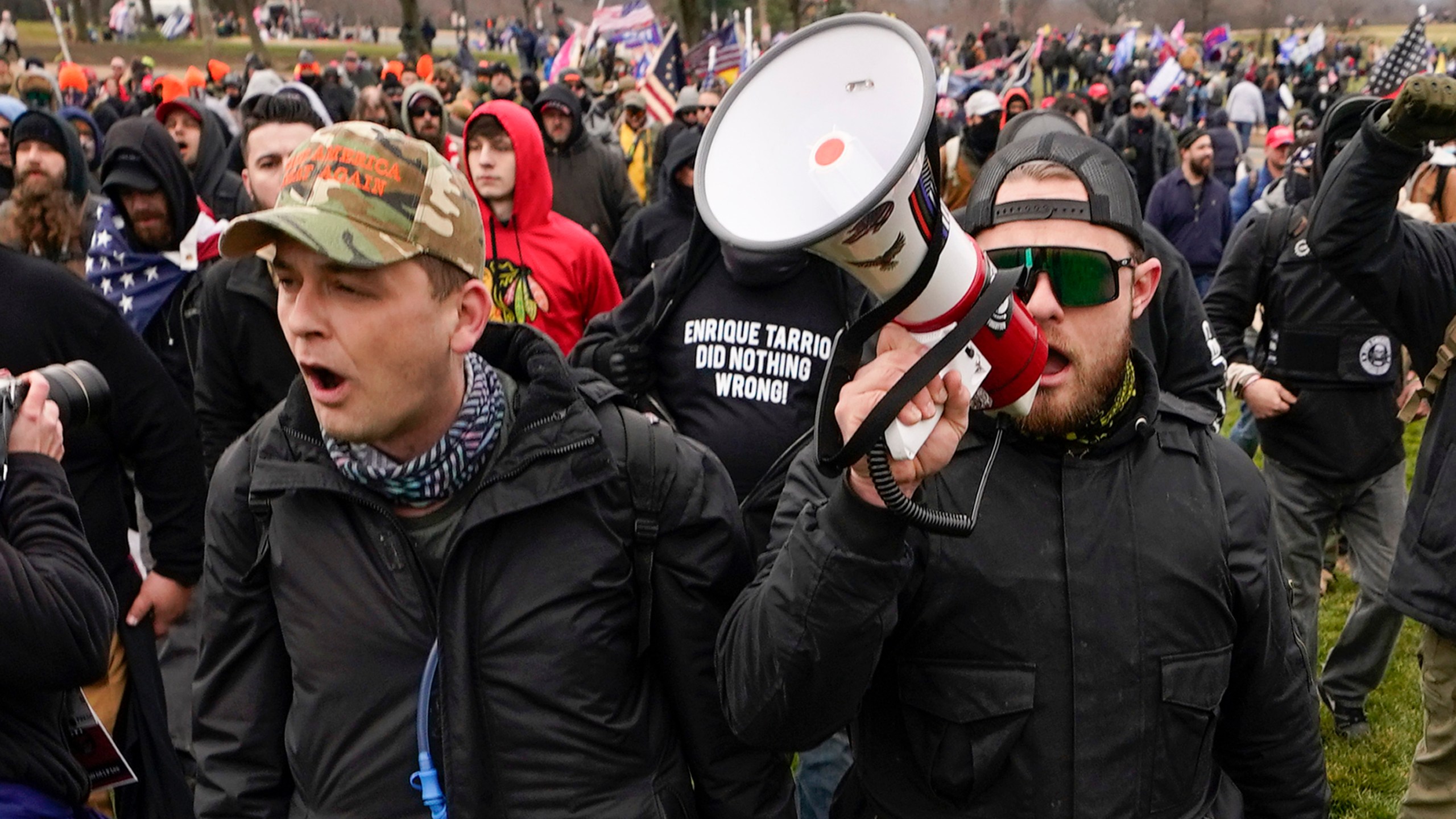 Proud Boys members Zachary Rehl, left, and Ethan Nordean, left, walk toward the U.S. Capitol in Washington, in support of President Donald Trump on Jan. 6, 2021. (Carolyn Kaster/Associated Press)