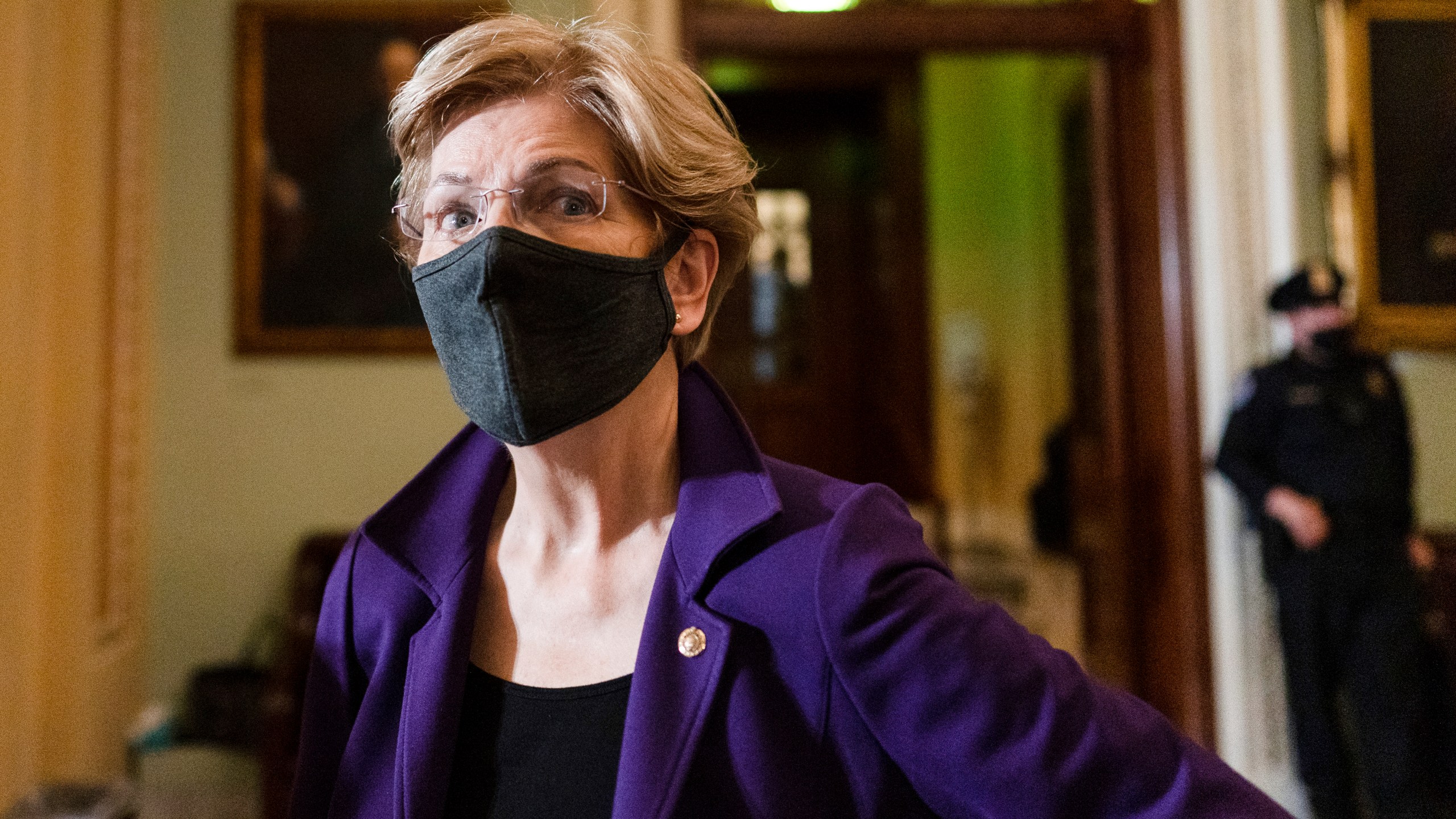 Sen. Elizabeth Warren, D-Mass., speaks to a reporter on Capitol Hill in Washington, Tuesday, Dec. 7, 2021.(AP Photo/Carolyn Kaster)