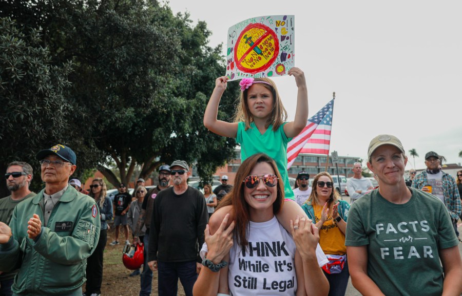 Anti-vaccine protesters stage a protest outside of the San Diego Unified School District office to protest a vaccination mandate for students on Sept. 28, 2021 in San Diego. (Sandy Huffaker/Getty Images)