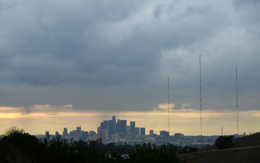 A storm cloud hovers over Los Angeles, California on December 13, 2021. (FREDERIC J. BROWN/AFP via Getty Images)