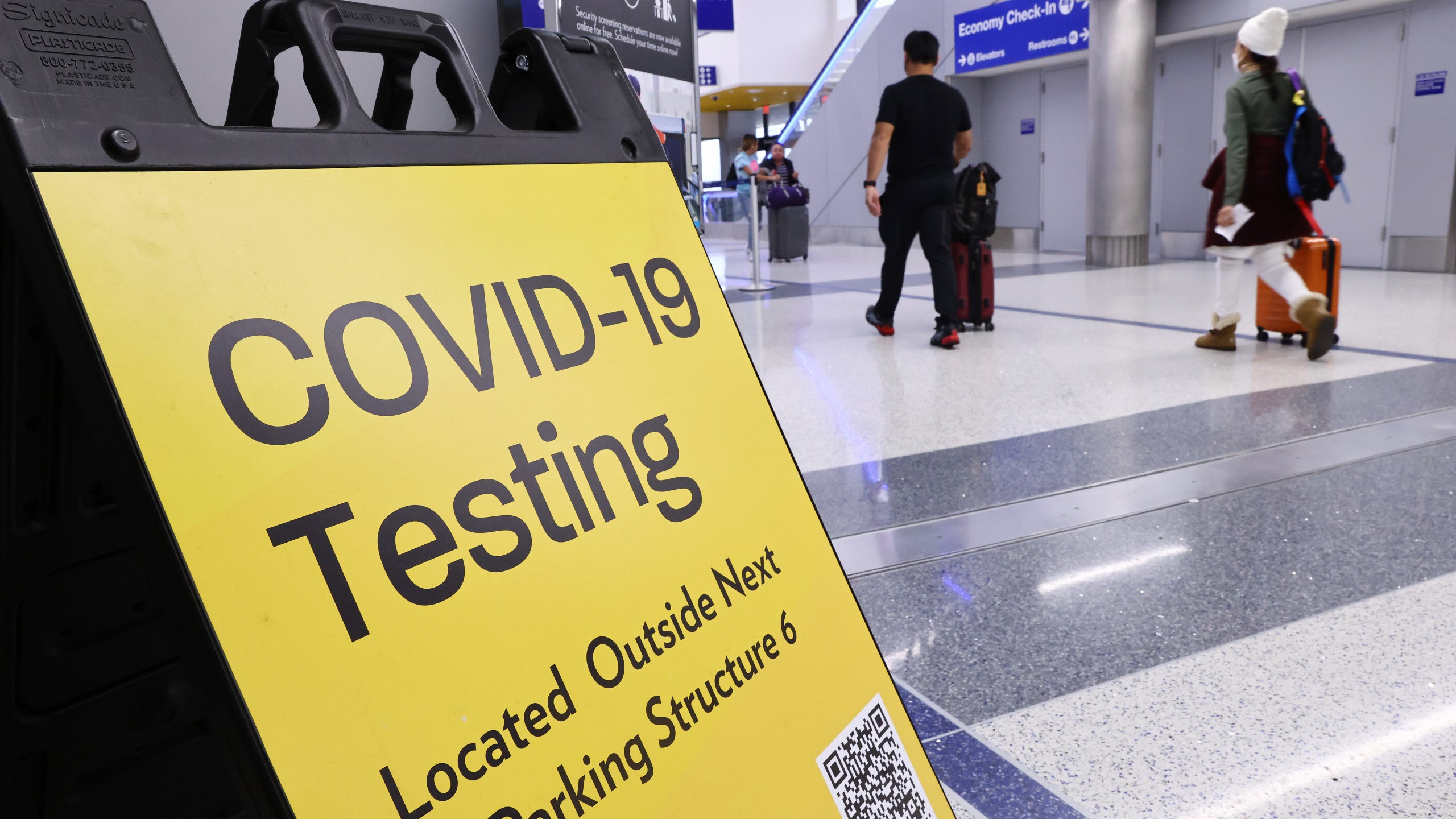 A sign promotes a COVID-19 testing location located inside the Tom Bradley International Terminal at Los Angeles International Airport (LAX) on Dec. 1, 2021 in Los Angeles, California. (Mario Tama/Getty Images)