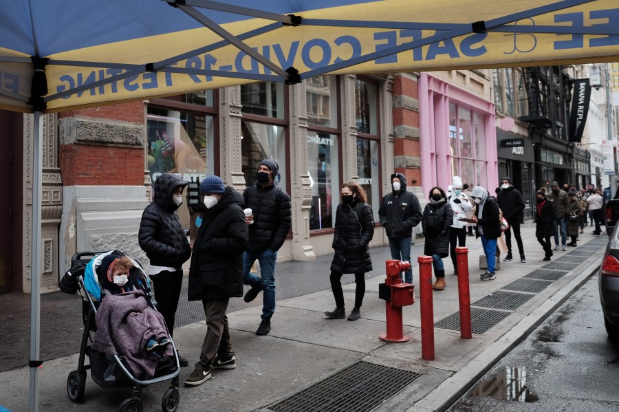 People wait in long lines in Manhattan to get tested for COVID-19 on Dec. 22, 2021 in New York City. (Spencer Platt/Getty Images)