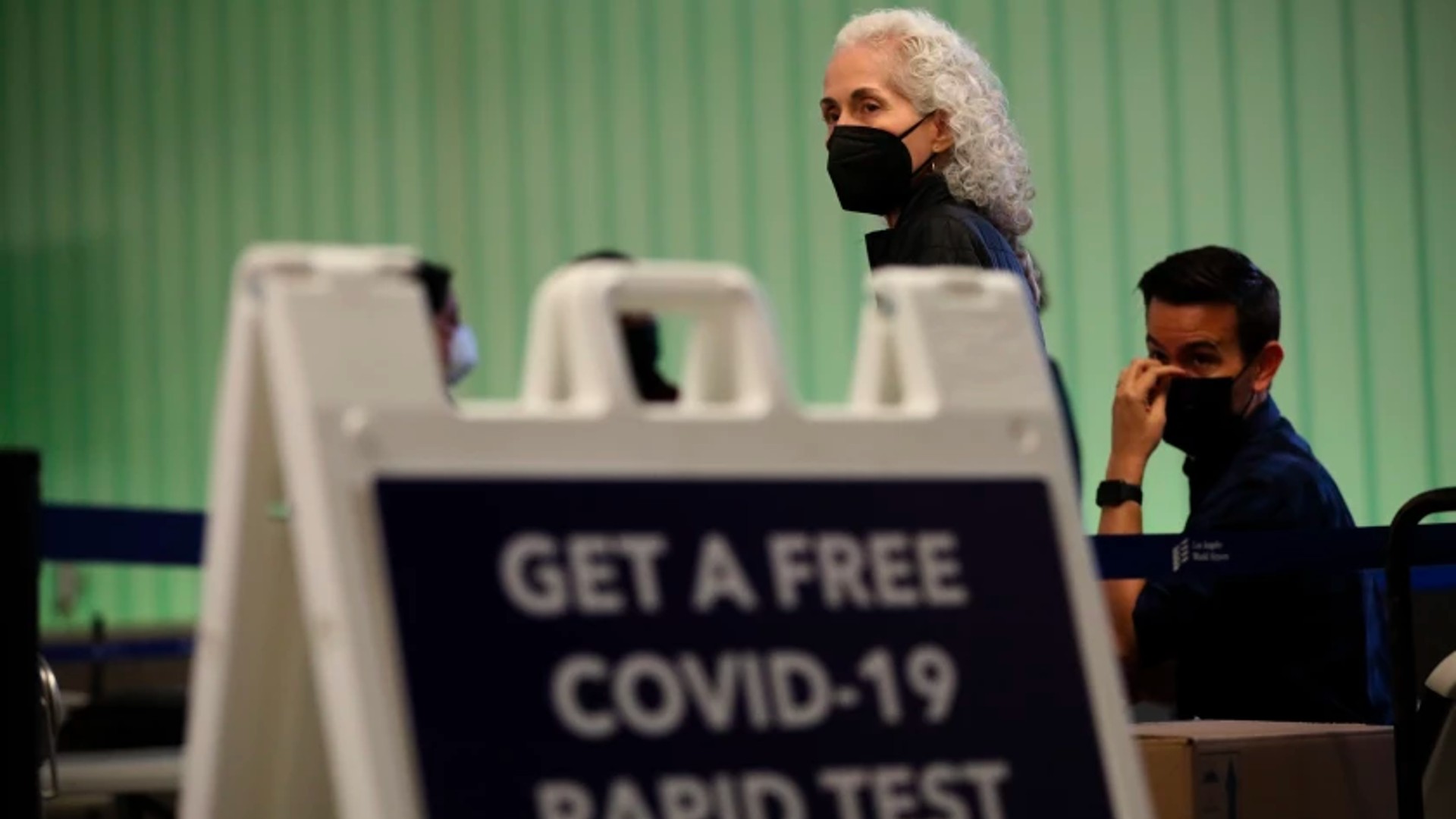 Barbara Ferrer, director of L.A. County Department of Health, visits a free rapid-testing site Friday at Los Angeles International Airport.(Genaro Molina / Los Angeles Times)