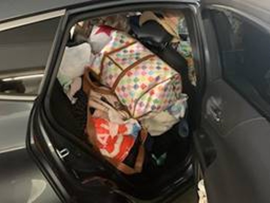 CHP released this photo of the woman's car, which also appeared to be packed with the allegedly stolen goods.