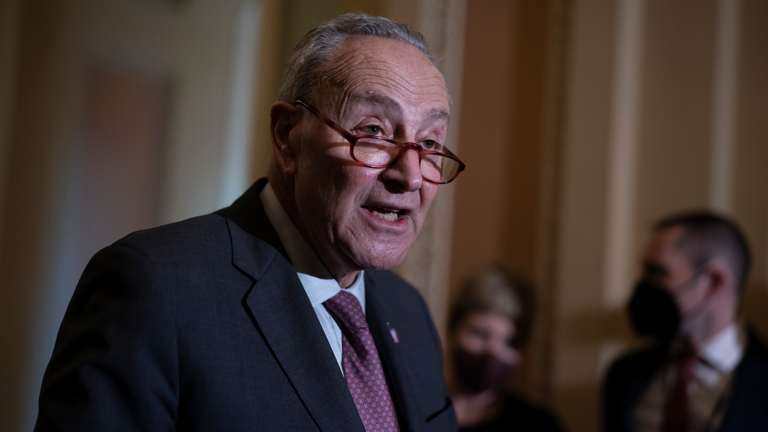 Senate Majority Leader Chuck Schumer, D-N.Y., speaks to reporters after a Democratic policy meeting at the Capitol in Washington, Tuesday, Dec. 14, 2021. (AP Photo/J. Scott Applewhite)