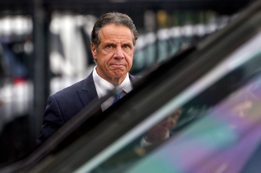 New York Gov. Andrew Cuomo prepares to board a helicopter after announcing his resignation on Aug. 10, 2021, in New York. Westchester County District Attorney Mimi Rocah announced Tuesday, Dec. 28, 2021, she couldn't pursue charges under New York law against Cuomo stemming from allegations from two women that he planted unwanted kisses on their cheeks. (AP Photo/Seth Wenig, File)