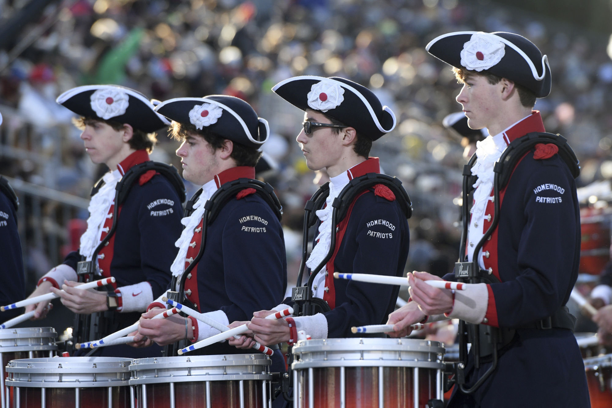 Members of the Homewood High School Patriot Band from Homewood, Ala., perform during the 133rd Rose Parade in Pasadena, Calif., on Saturday, Jan. 1, 2022. Members of the band have tested positive for COVID-19 since returning home, and the entire school switched to virtual classes because of an outbreak. (AP Photo/Michael Owen Baker, File)